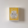 BICYCLE × Mark Gonzales の黄色いトランプカード箱の写真