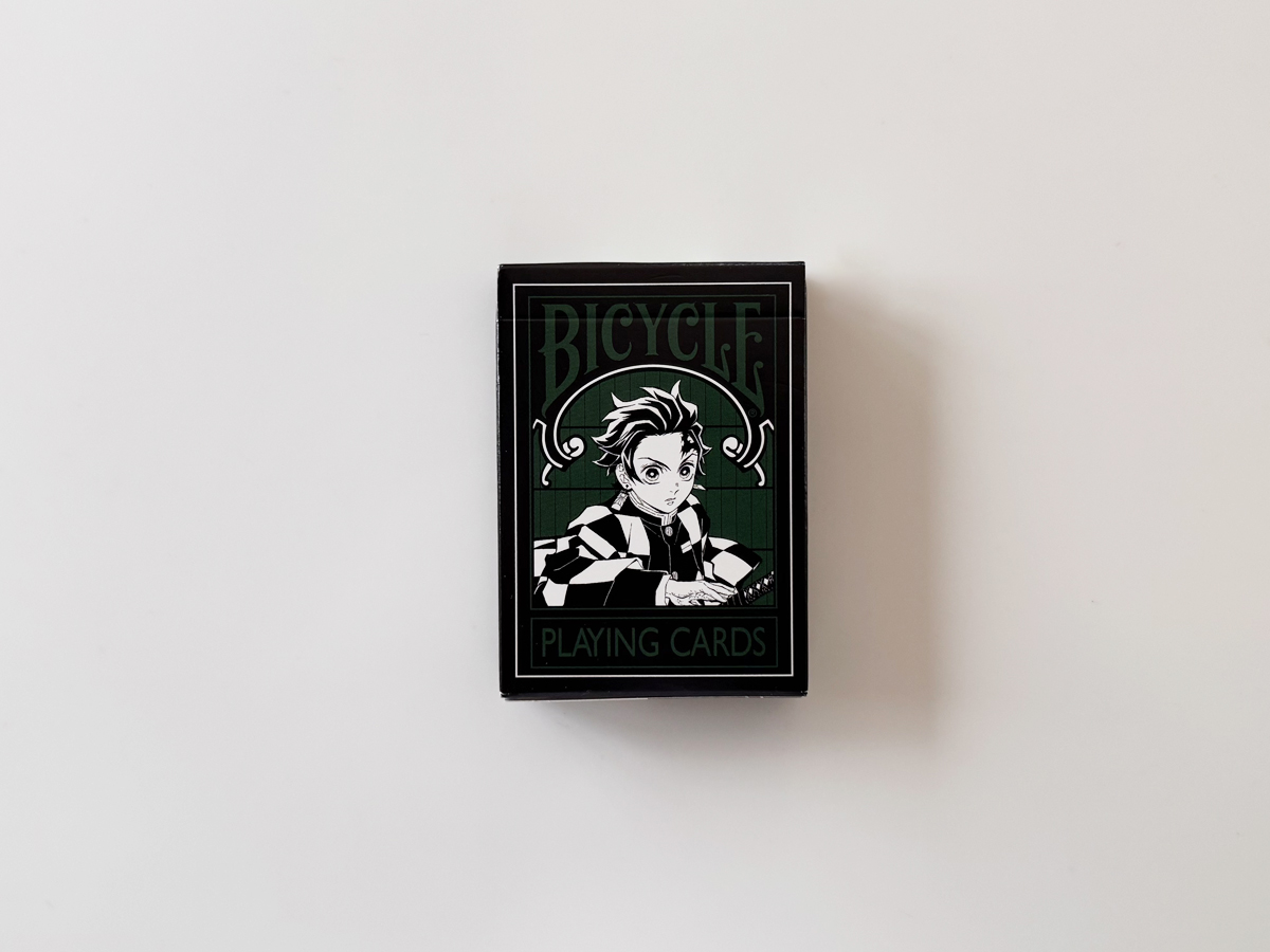 Bicycle×鬼滅の刃の外箱正面（主人公を描いた深緑のボックス）